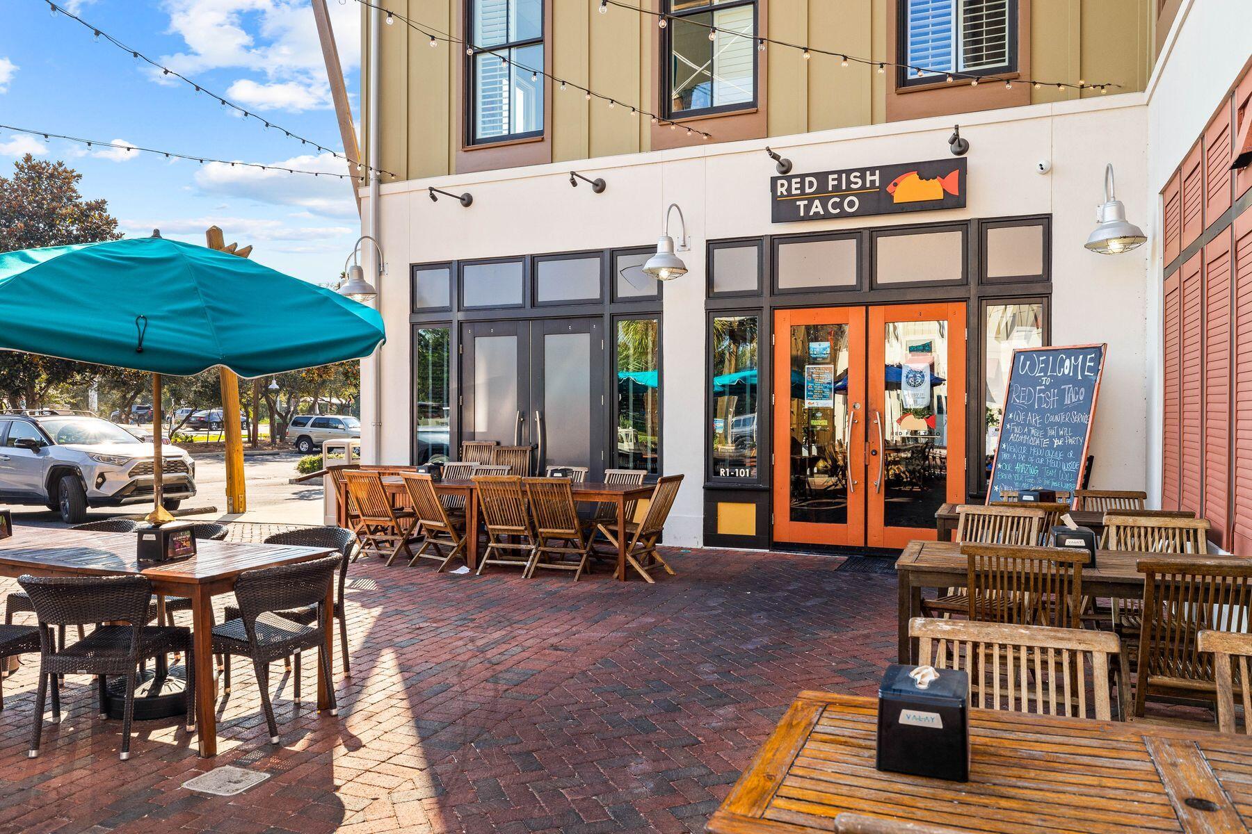 421 Gulfview Circle Santa Rosa Beach, FL 32459 - Photo 33 of 34 a view of a chairs and table in the patio