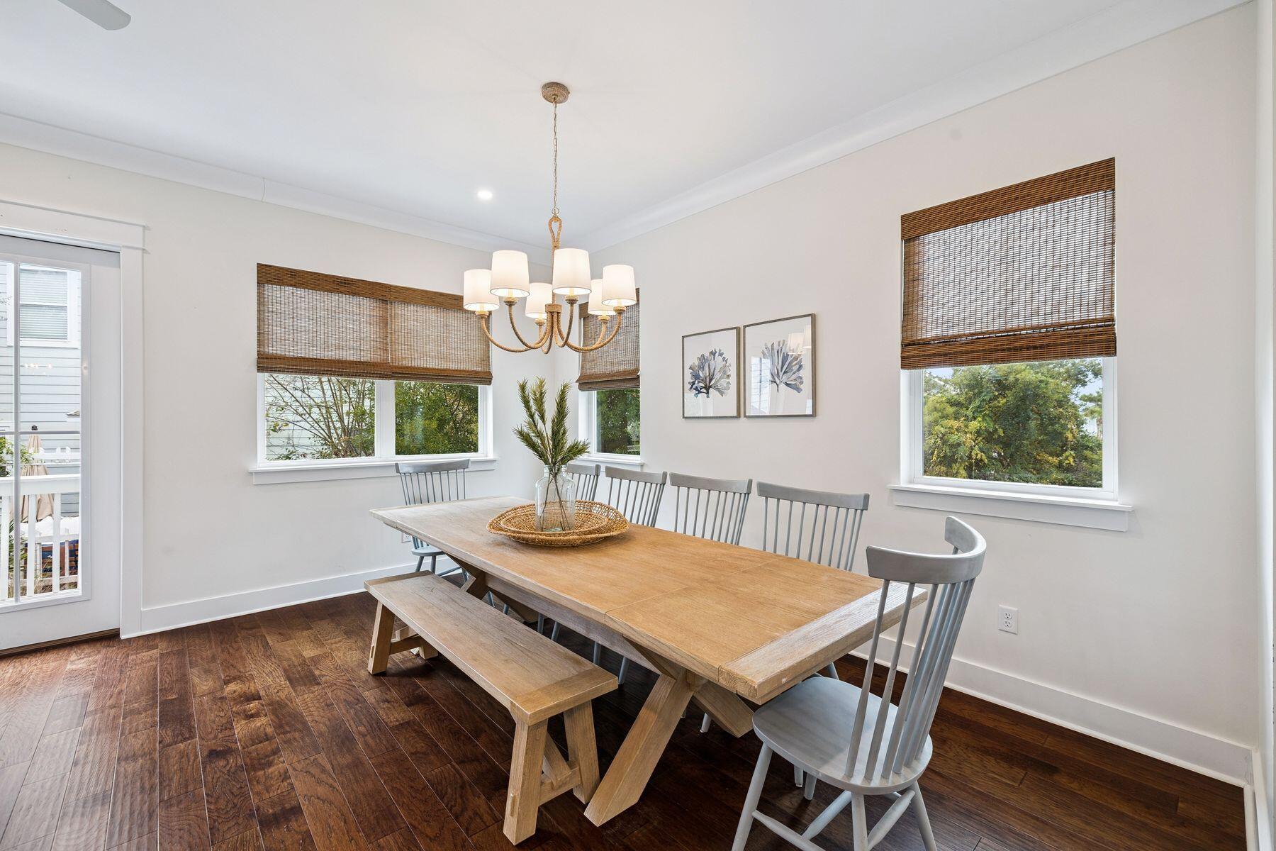 421 Gulfview Circle Santa Rosa Beach, FL 32459 - Photo 9 of 34 a view of a dining room with furniture window and wooden floor