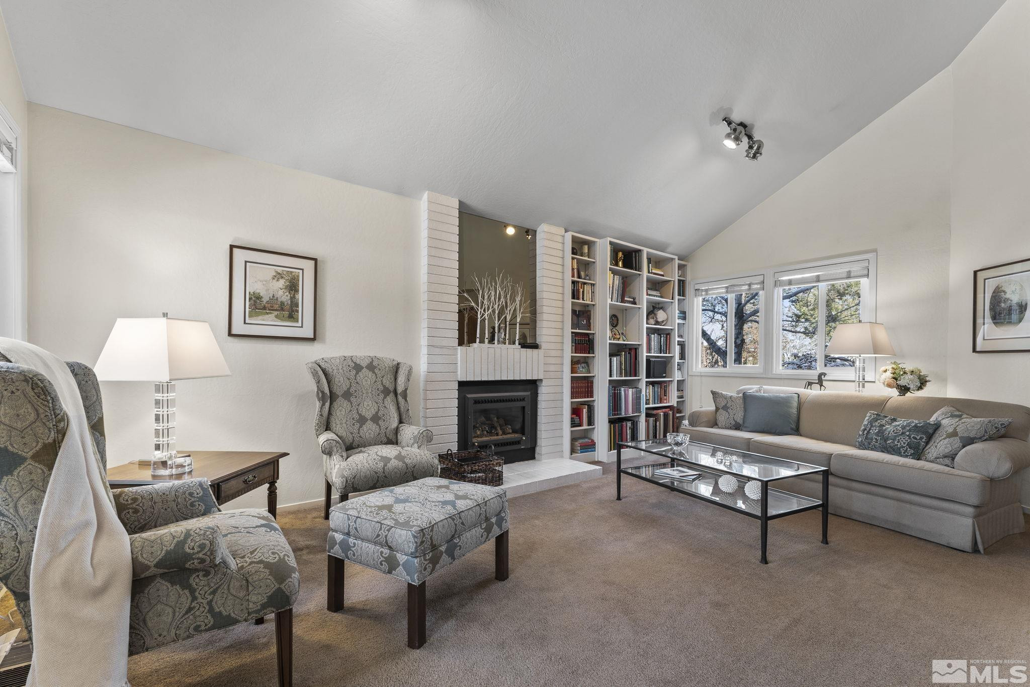 4303 Clyde Court Reno, NV 89509 - Photo 6 of 40 a living room with furniture and a fireplace