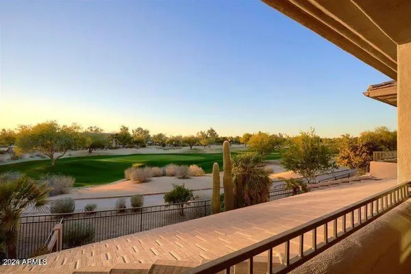 a view of a lake from a balcony