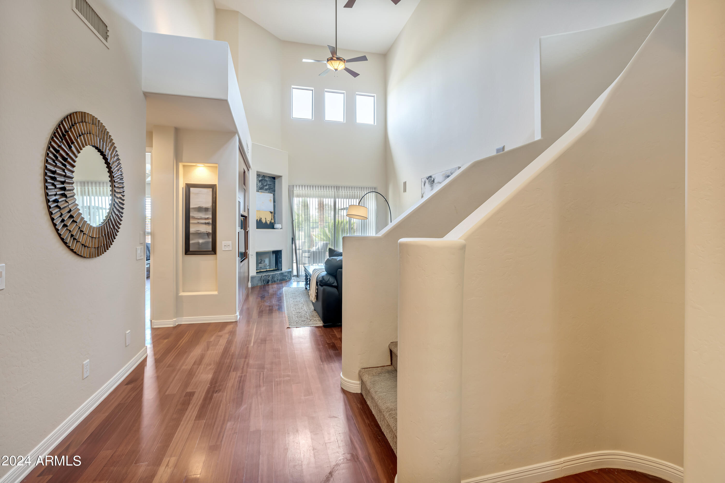 15240 North Clubgate Drive, Unit 150 Scottsdale, AZ 85254 - Photo 4 of 42 a view of entryway and hall with wooden floor