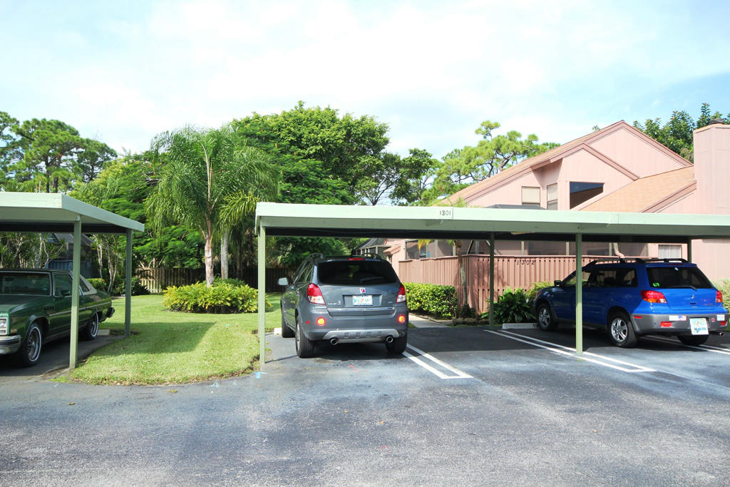 1301 Summerwinds Lane Jupiter, FL 33458 - Photo 18 of 19 Carport