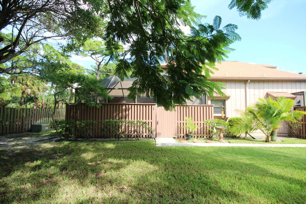 1301 Summerwinds Lane Jupiter, FL 33458 - Photo 2 of 19 Front2