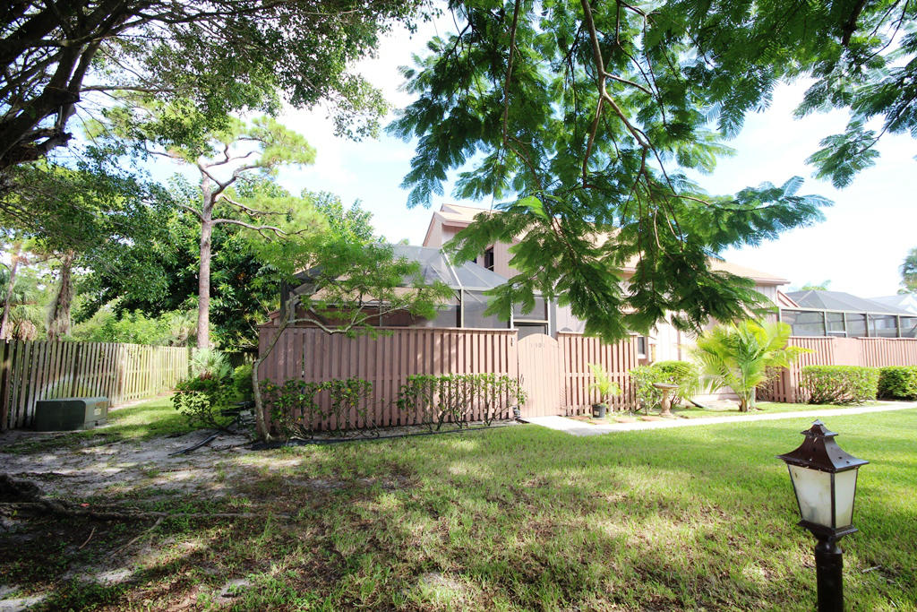 1301 Summerwinds Lane Jupiter, FL 33458 - Photo 3 of 19 front3