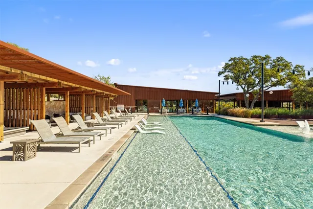 a view of a house with backyard porch and patio