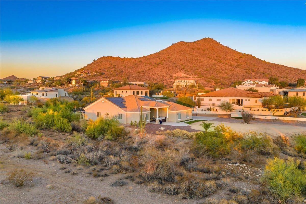 412 East Yearling Road Phoenix, AZ 85085 - Photo 44 of 51 a view of a town with mountains in the background