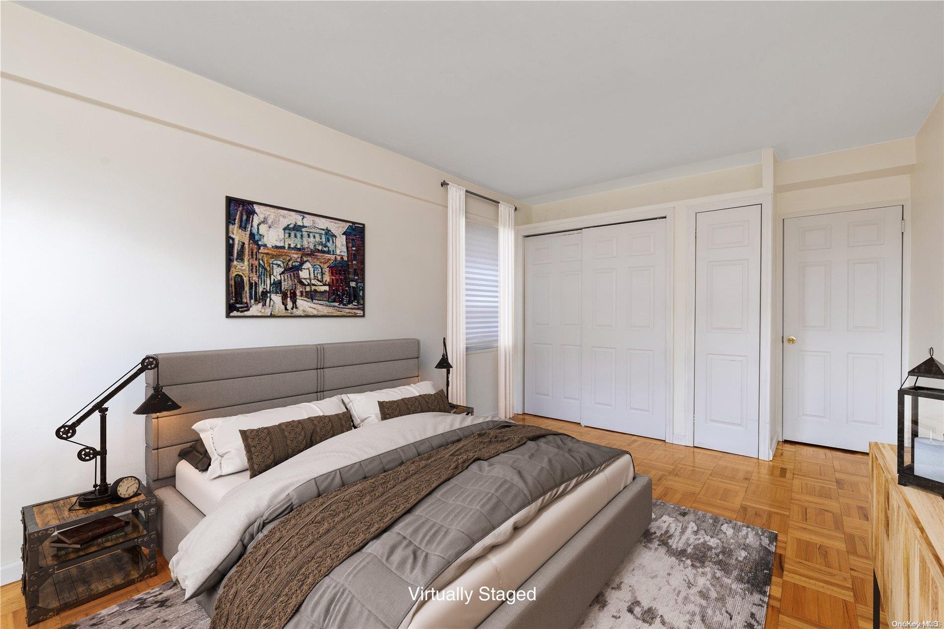 109-33 71st Road, Unit 7B Queens, NY 11375 - Photo 11 of 14 a bedroom with a bed and a painting on the wall