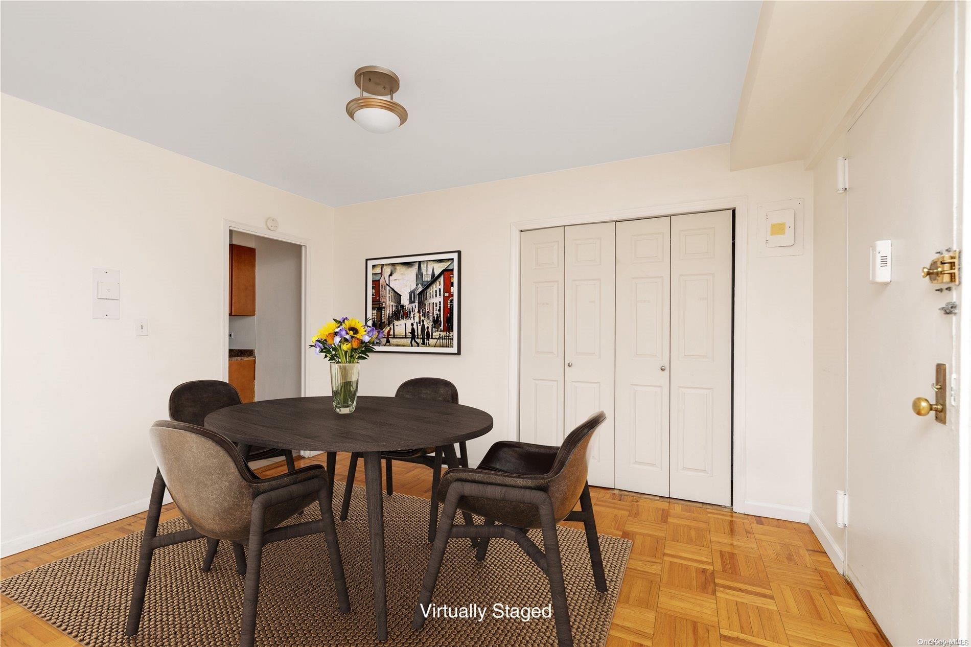 109-33 71st Road, Unit 7B Queens, NY 11375 - Photo 5 of 14 a view of a dining room with furniture and wooden floor
