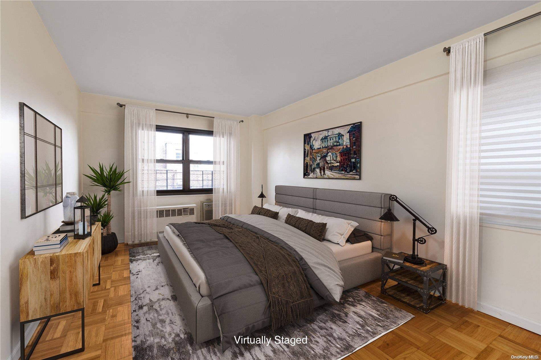 109-33 71st Road, Unit 7B Queens, NY 11375 - Photo 9 of 14 a bedroom with a bed a couch and windows