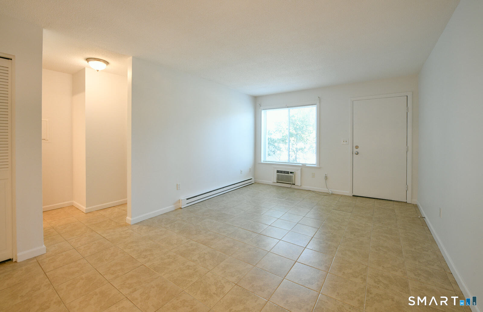 2 Hamre Lane, Unit D Branford, CT 06405 - Photo 12 of 18 an empty room with windows and closet