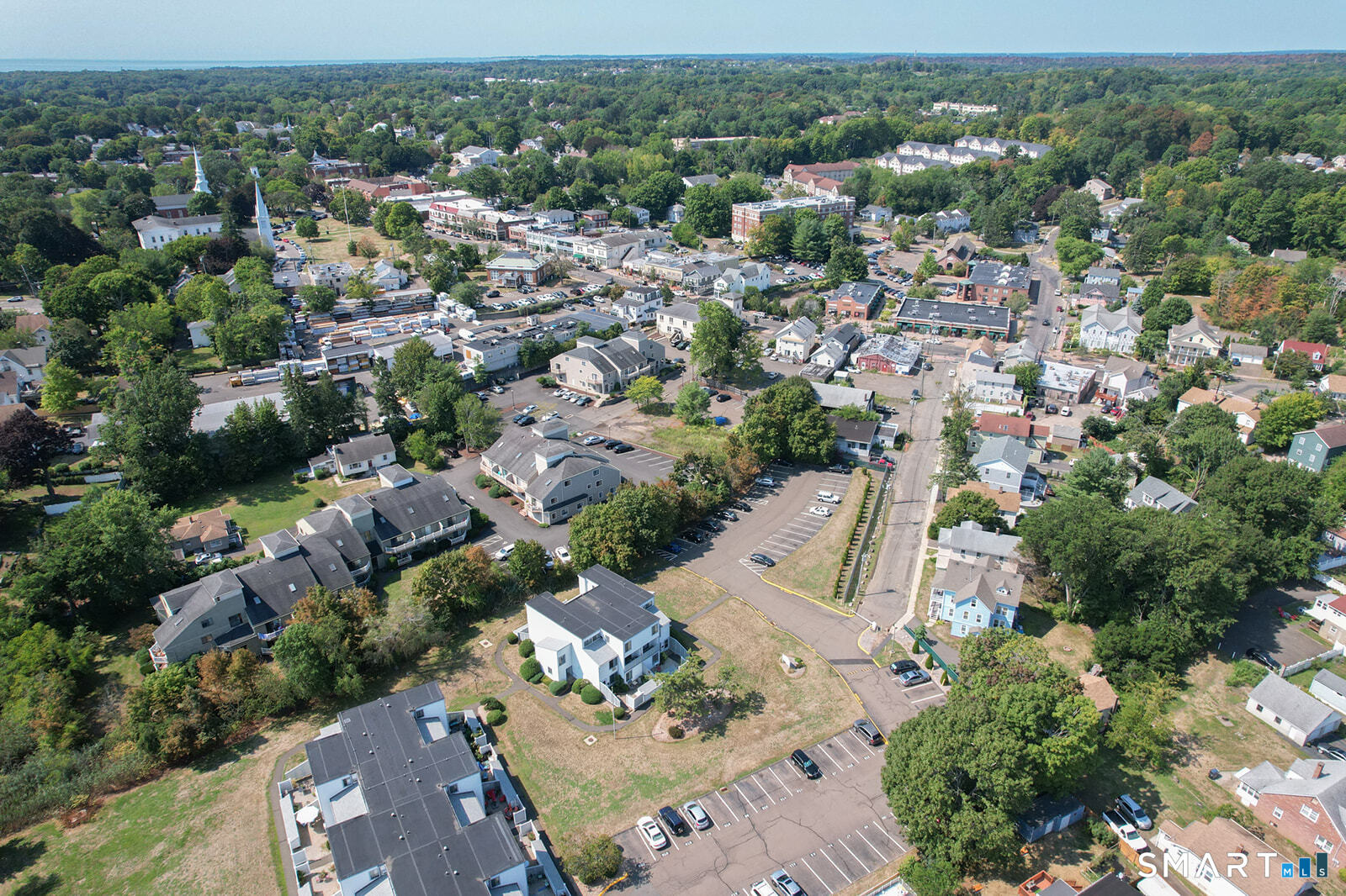 2 Hamre Lane, Unit D Branford, CT 06405 - Photo 18 of 18 an aerial view of a city with lots of residential buildings