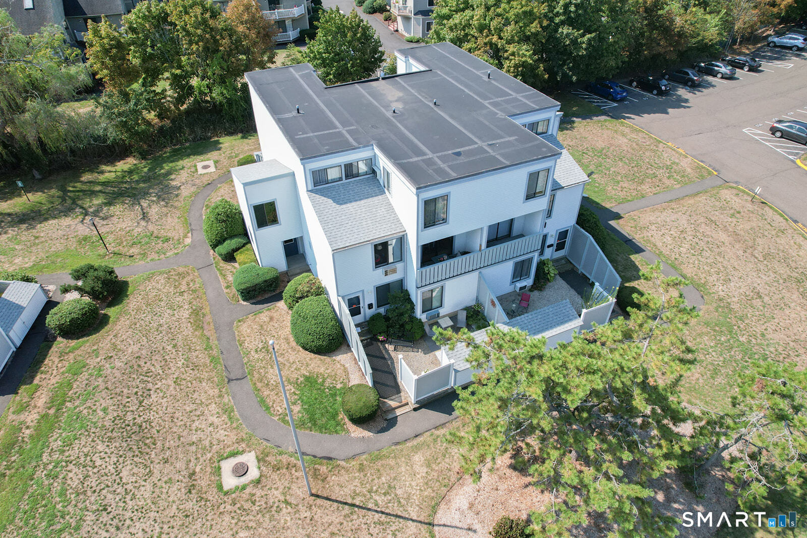 2 Hamre Lane, Unit D Branford, CT 06405 - Photo 4 of 18 an aerial view of a house with yard swimming pool and outdoor seating