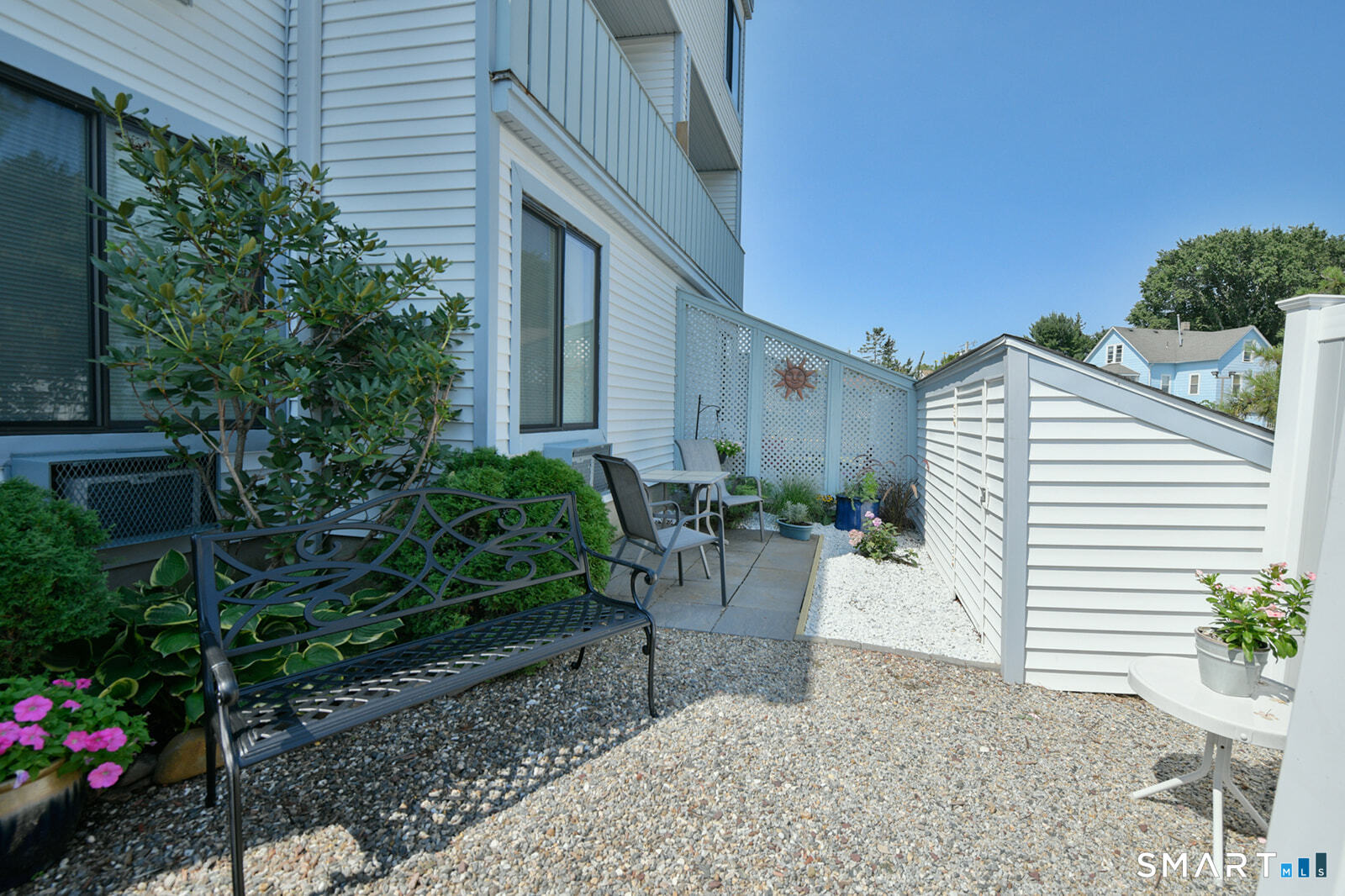 2 Hamre Lane, Unit D Branford, CT 06405 - Photo 7 of 18 a view of a house with a yard and sitting area