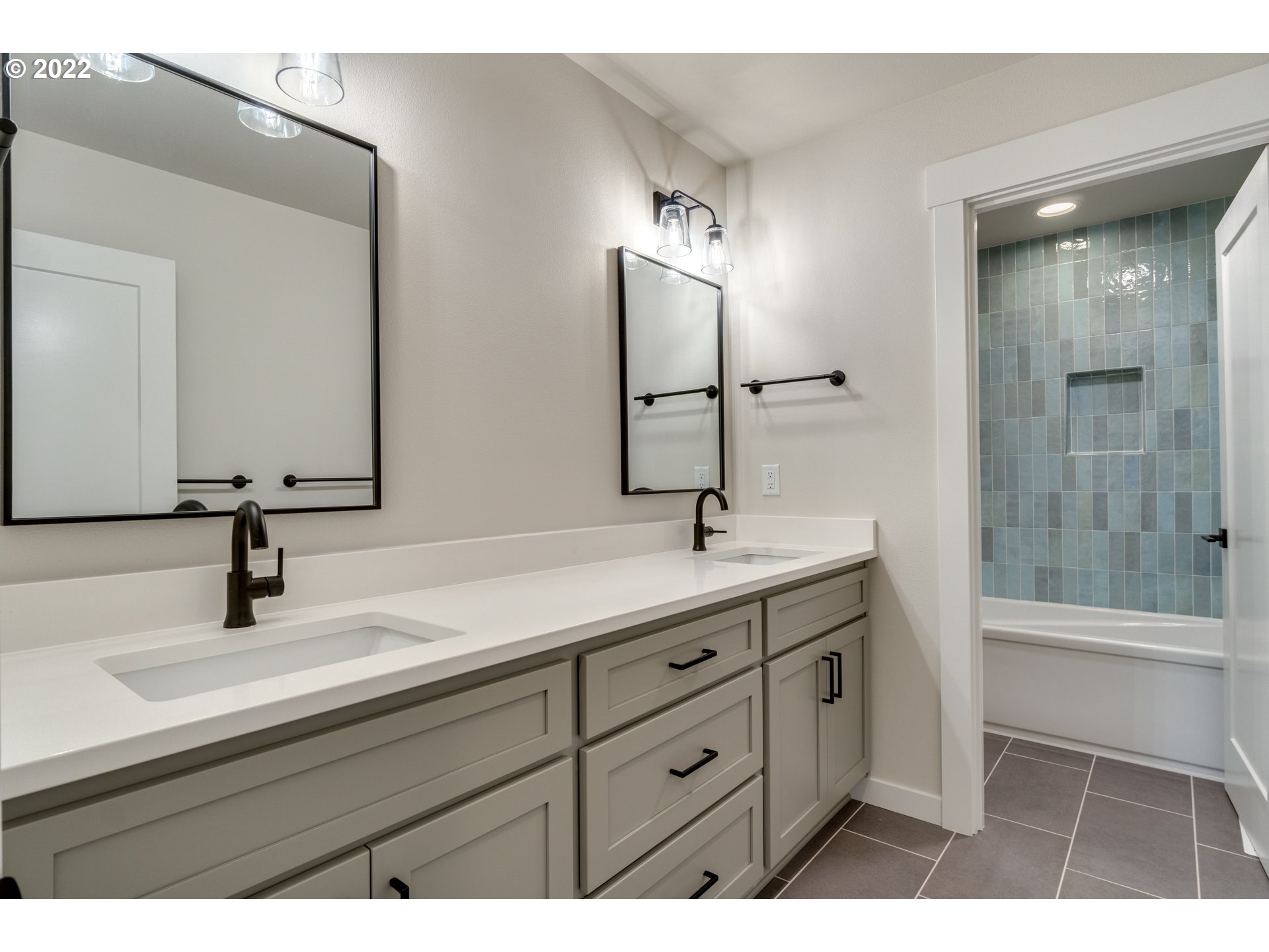 248 North 22nd Court Ridgefield, WA 98642 - Photo 9 of 15 a bathroom with a sink and a mirror