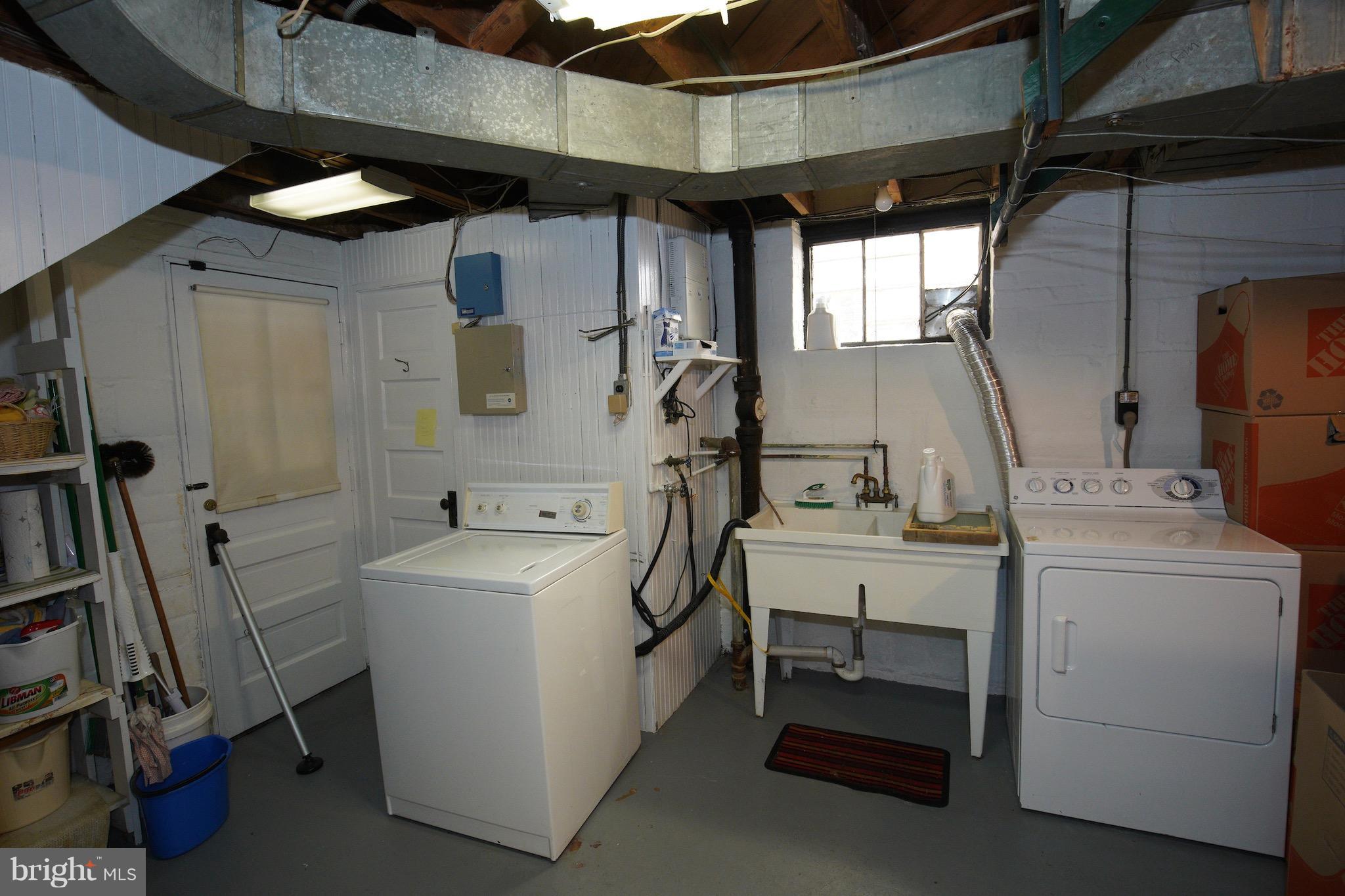 4334 Reno Road Northwest Washington, DC 20008 - Photo 14 of 16 a utility room with dryer and washer