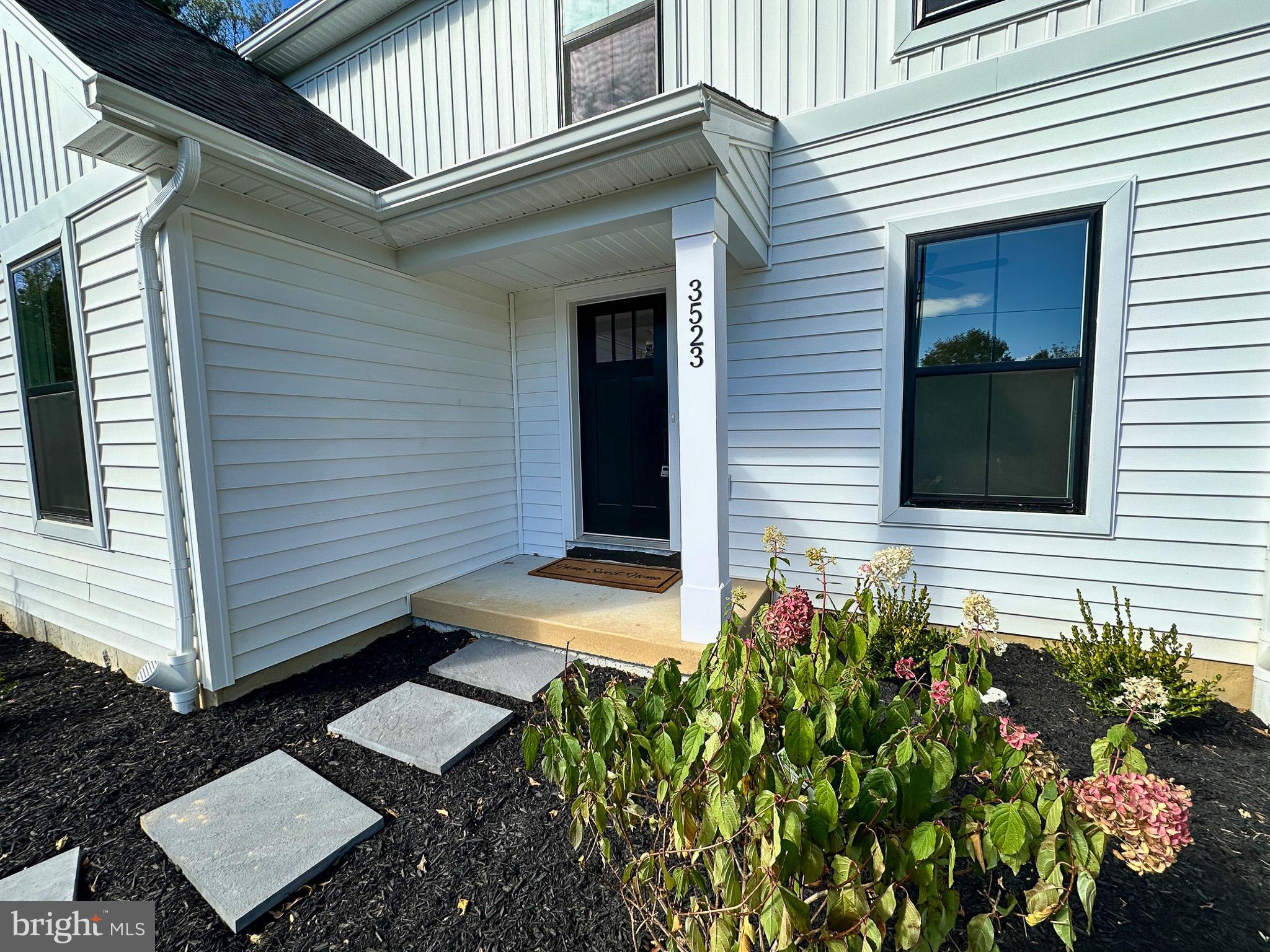 3523 Humpton Road Downingtown, PA 19335 - Photo 3 of 55 a view of a pathway of the house with a yard