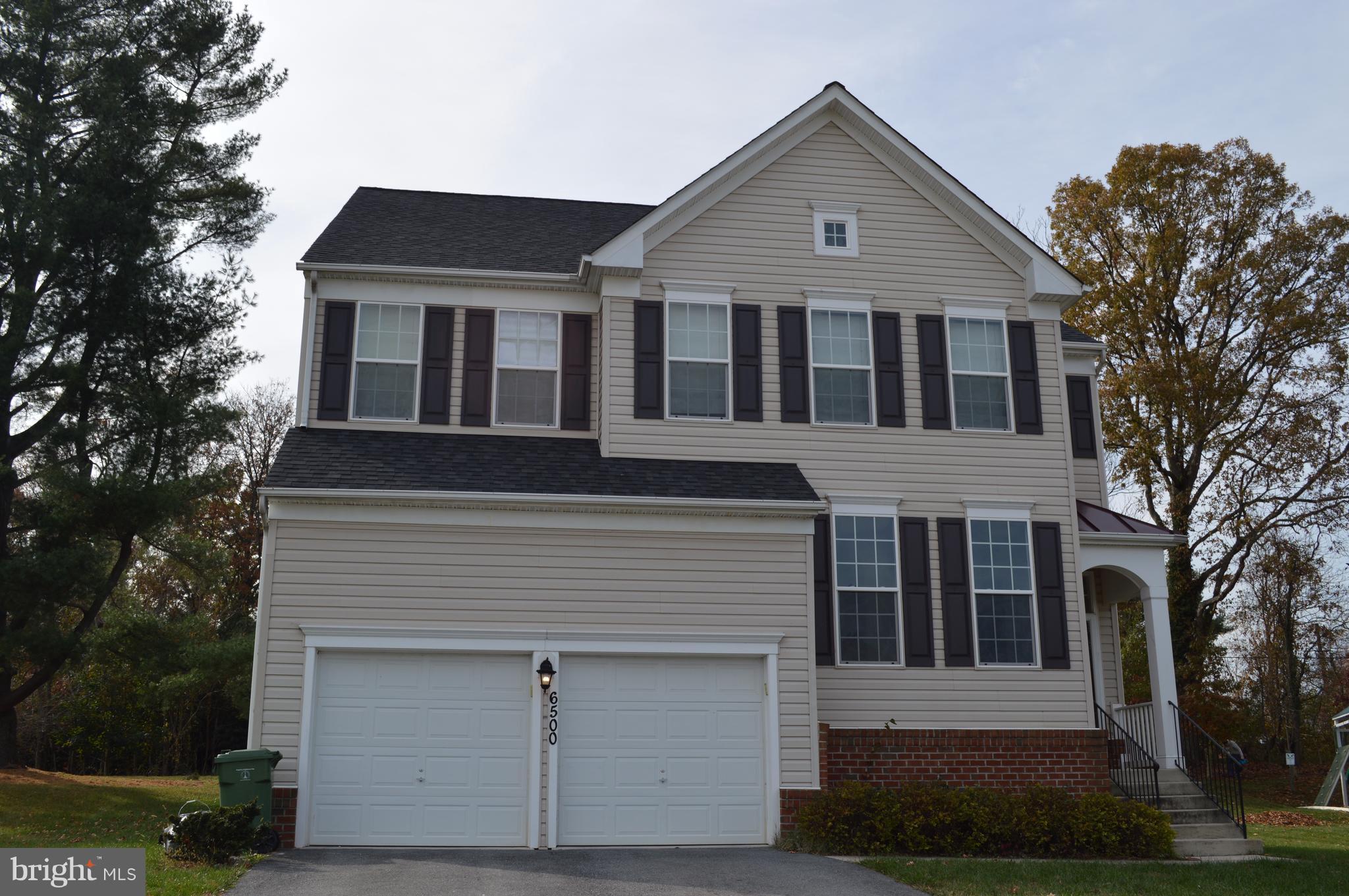 6500 Clarington Road Baltimore, MD 21209 - Photo 1 of 30 a front view of a house with a yard