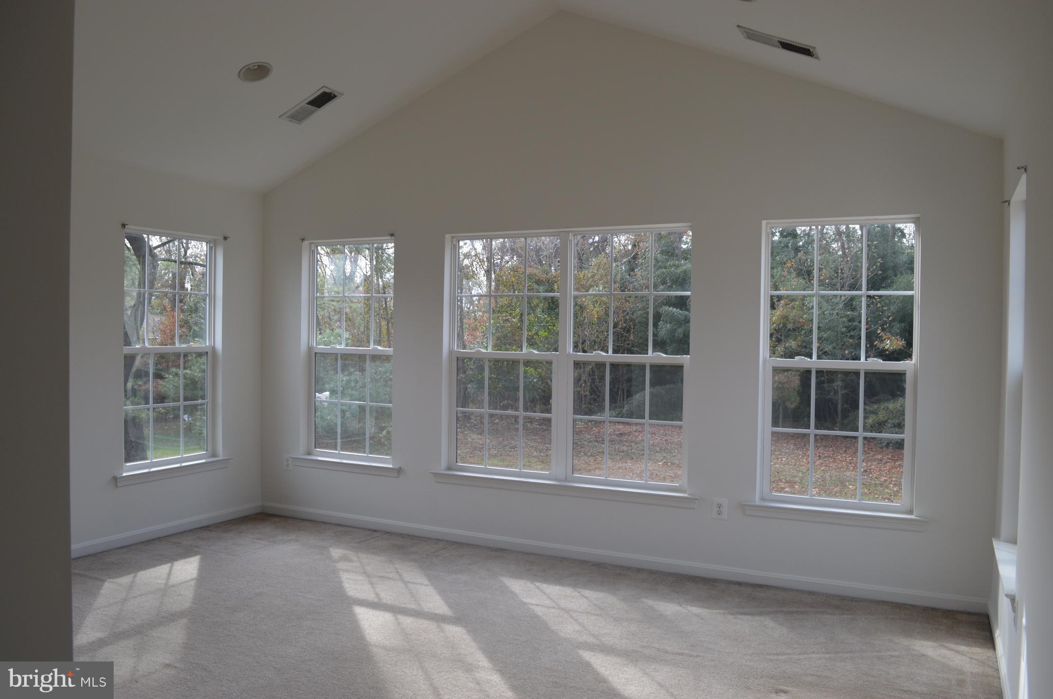 6500 Clarington Road Baltimore, MD 21209 - Photo 14 of 30 a view of an empty room with a window