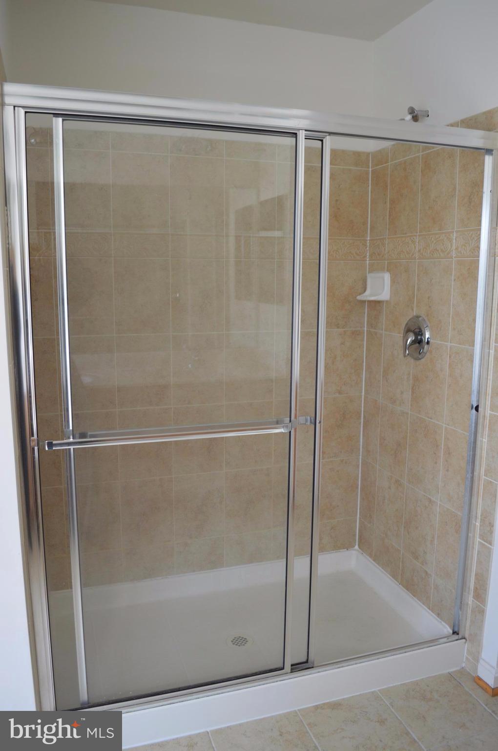6500 Clarington Road Baltimore, MD 21209 - Photo 17 of 30 a bathroom with a shower