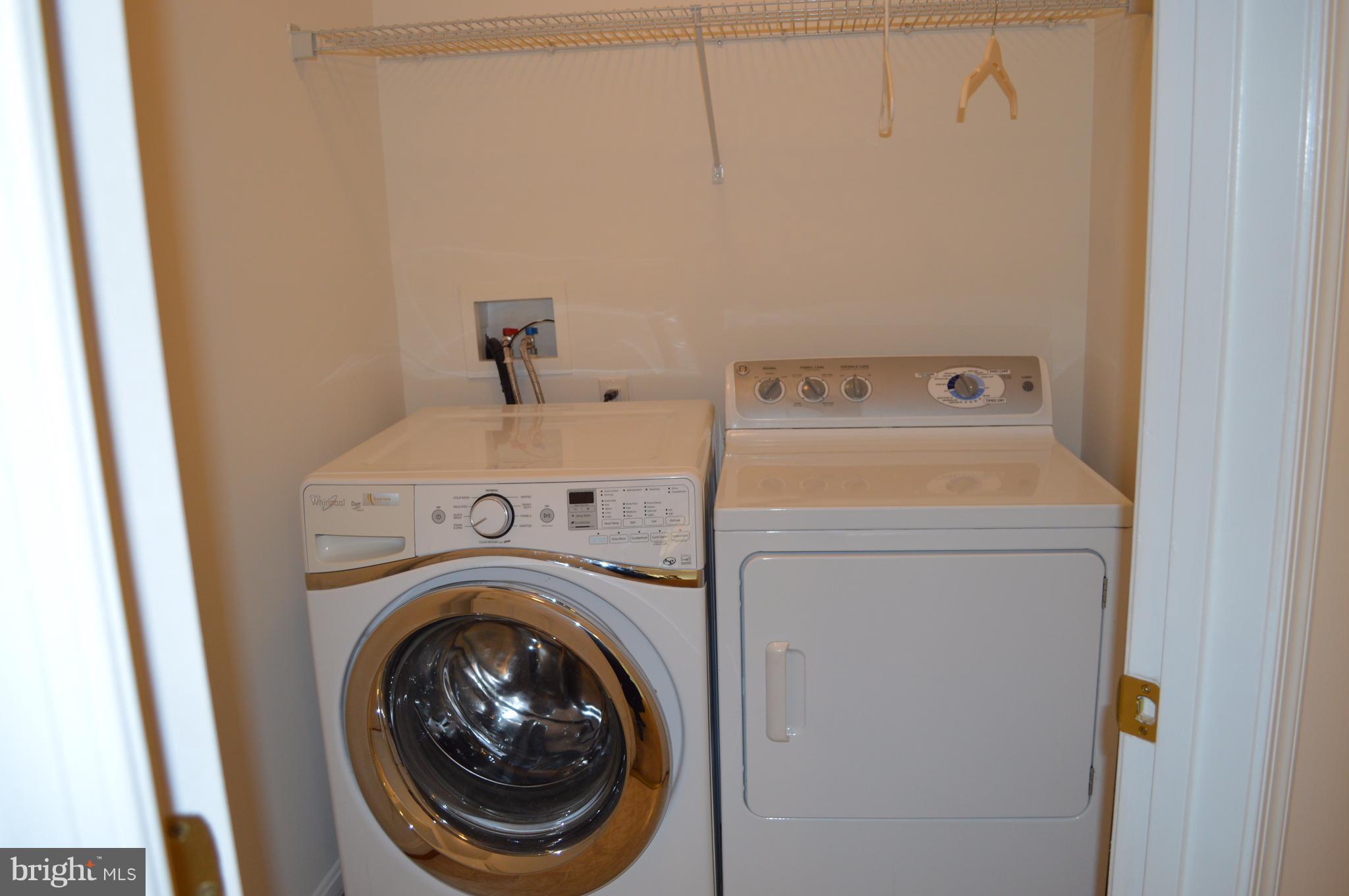 6500 Clarington Road Baltimore, MD 21209 - Photo 22 of 30 a utility room with dryer and washer