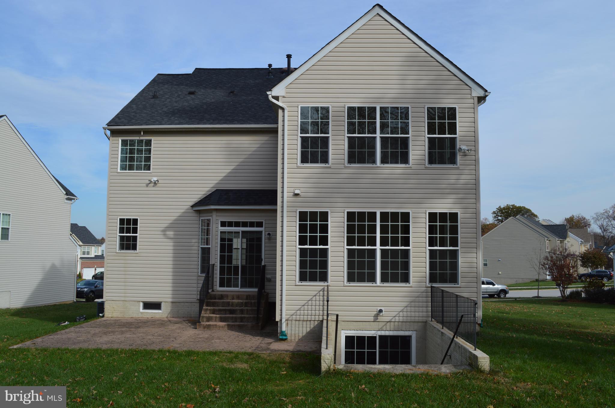 6500 Clarington Road Baltimore, MD 21209 - Photo 30 of 30 a front view of a house with a yard