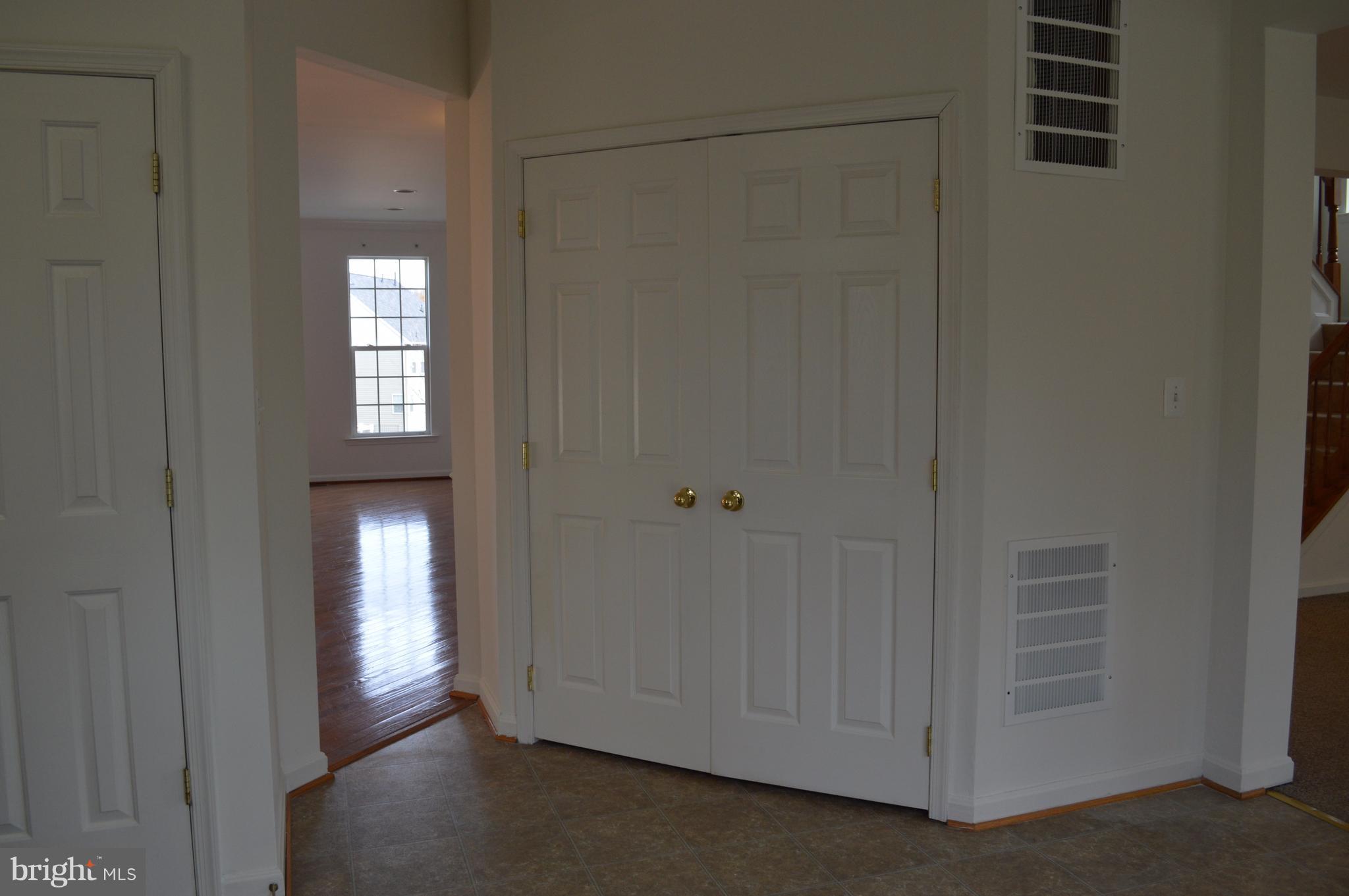 6500 Clarington Road Baltimore, MD 21209 - Photo 9 of 30 a view of empty room with windows