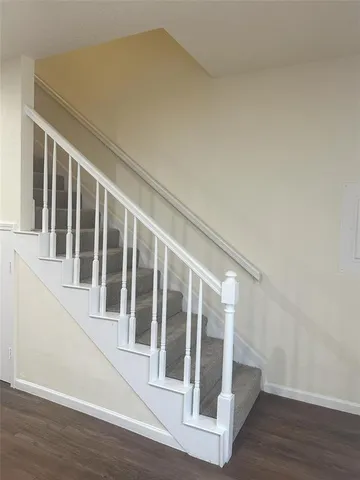 a view of entryway with wooden floor