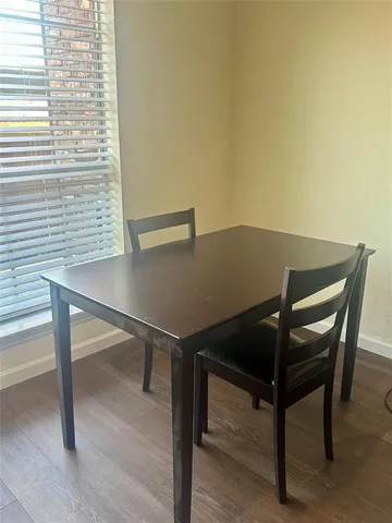 a view of balcony with furniture