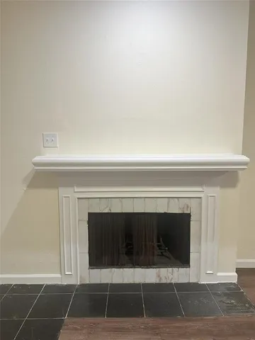 a close view of a fireplace in a white house