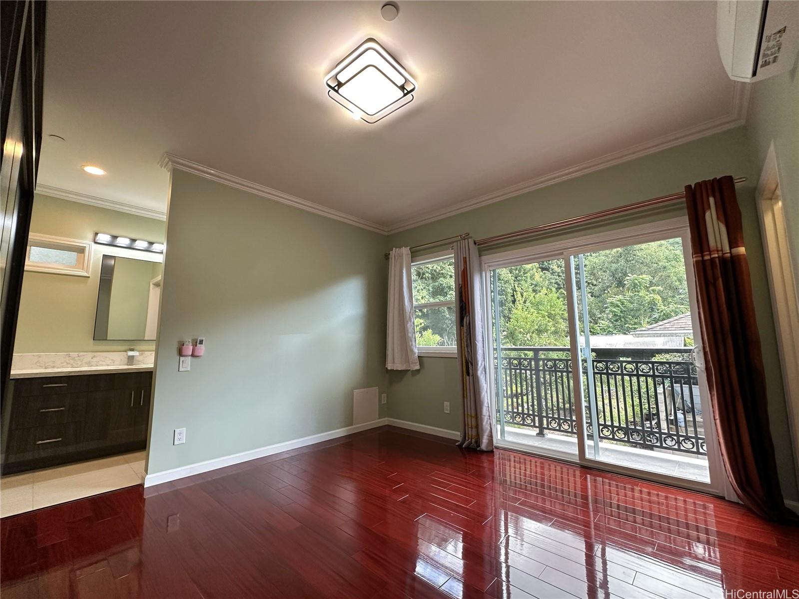 2763 Booth Road Honolulu, HI 96813 - Photo 9 of 25 a view of an empty room with wooden floor and a window