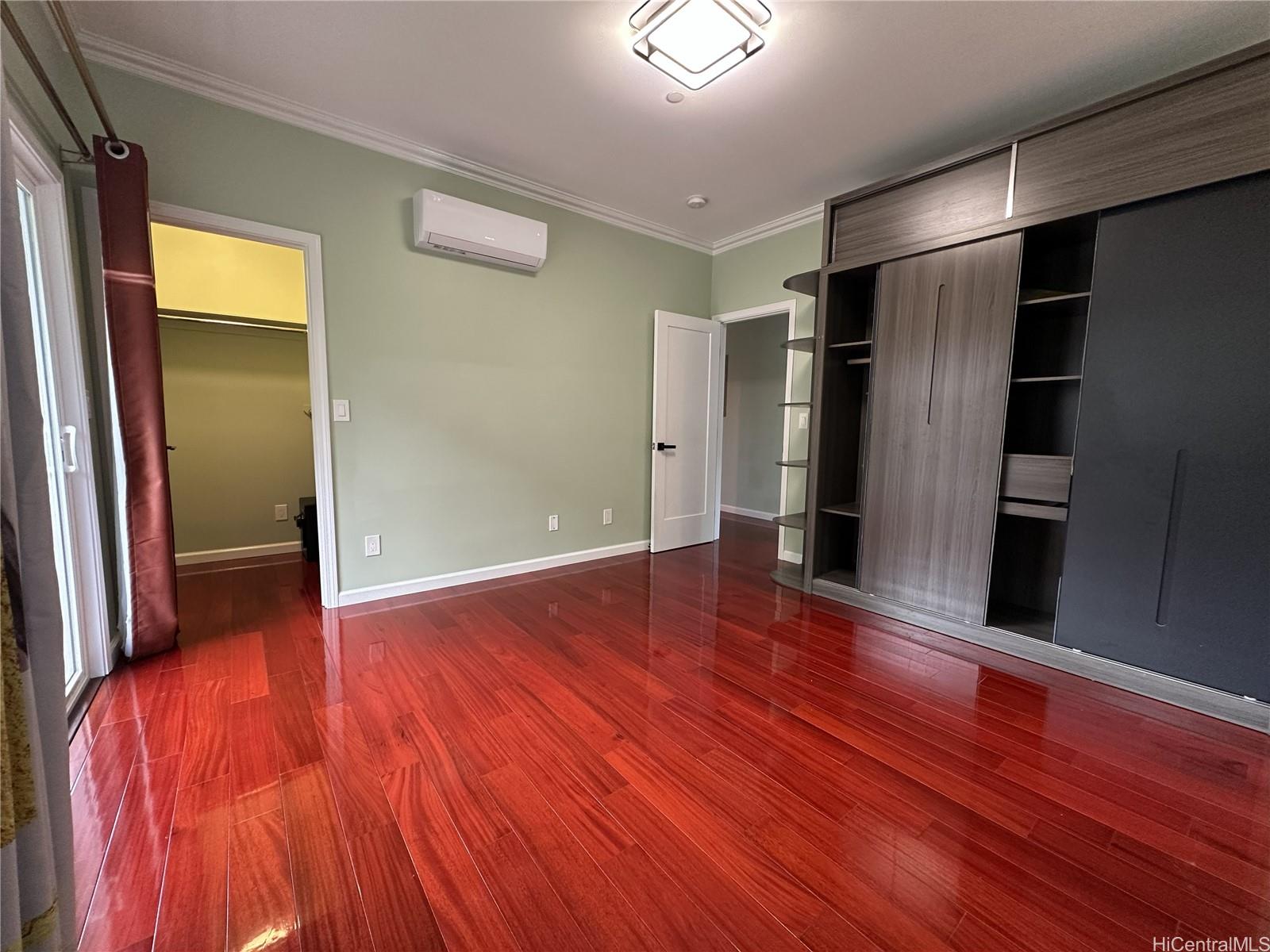 2763 Booth Road Honolulu, HI 96813 - Photo 10 of 25 a view of an empty room with wooden floor and a window