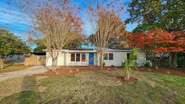 a house view with a garden space