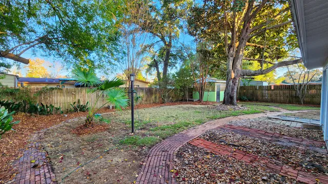a view of a lake with a tree