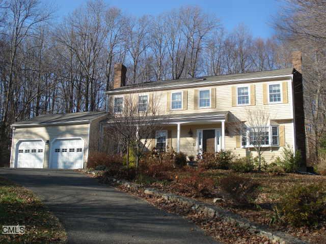 15 Barn Hill Road Monroe, CT 06468 - Photo 1 of 1 a front view of a house with garden
