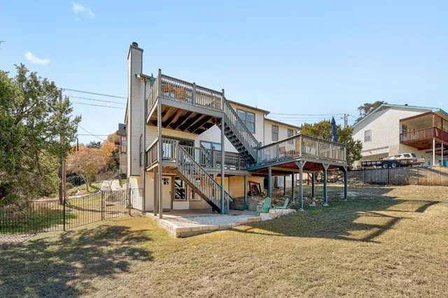 a view of a large building with large trees