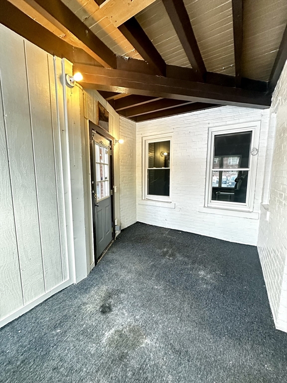 577 Pleasant Street, Unit 1L Holyoke, MA 01040 - Photo 23 of 24 a view of an empty room with windows