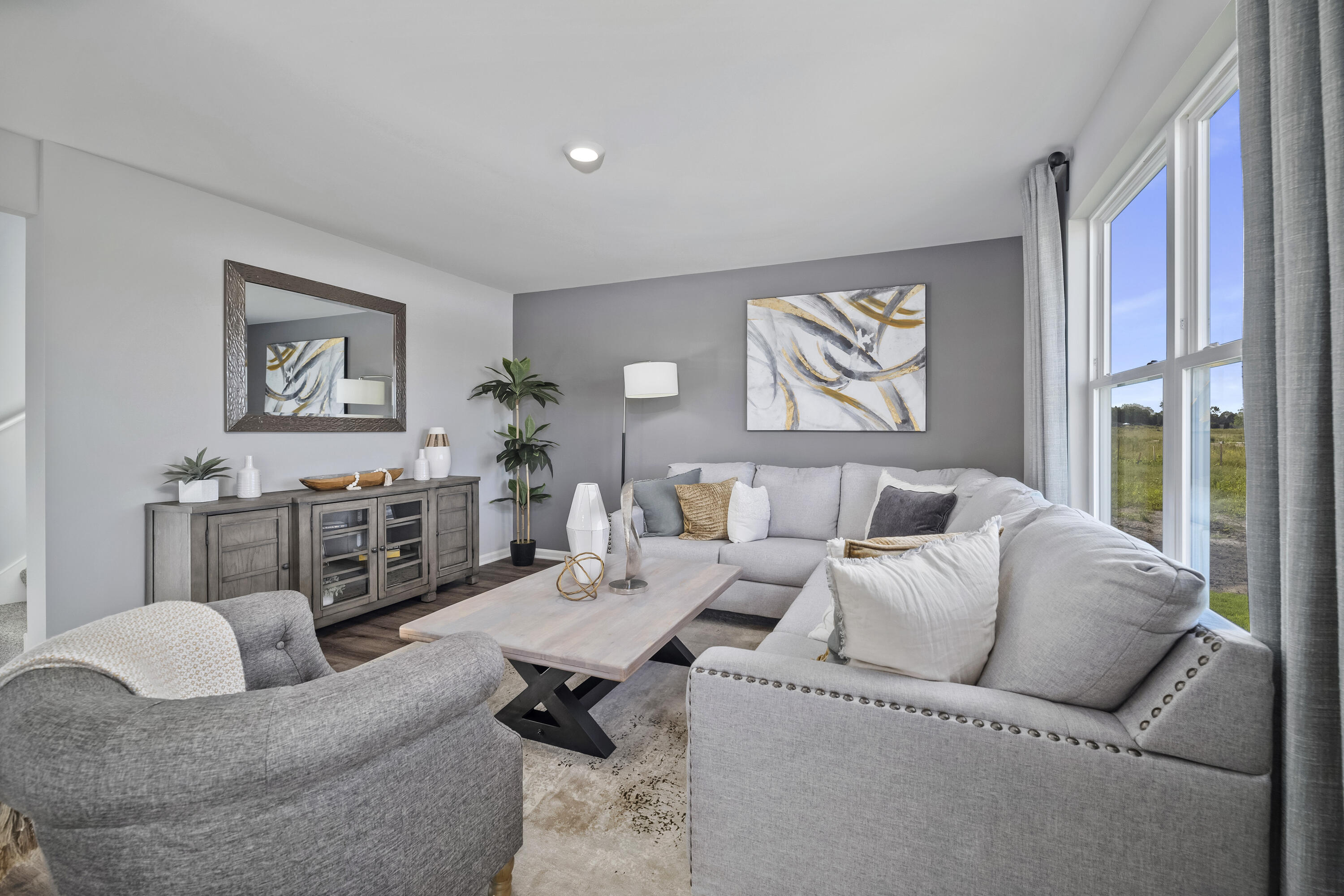 437 Fry Street Hebron, IN 46341 - Photo 15 of 41 a living room with furniture and a large window