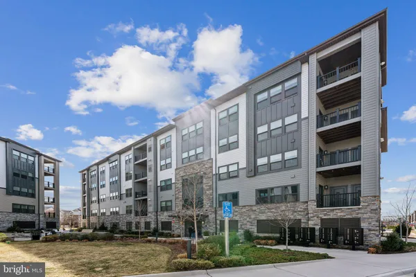 a front view of a building with street view