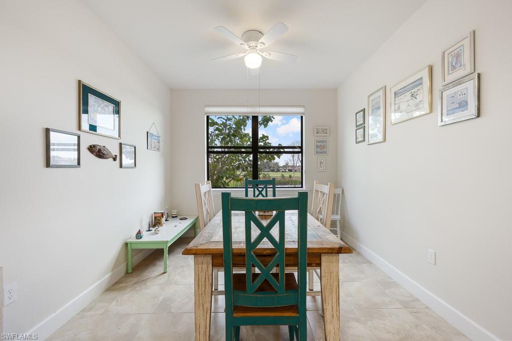 5698 Mayflower Way, Unit 403 Ave Maria, FL 34142 - Photo 11 of 27 a view of a workspace with furniture and a window