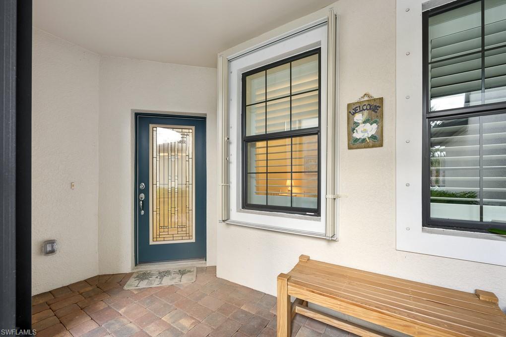 5698 Mayflower Way, Unit 403 Ave Maria, FL 34142 - Photo 20 of 27 a view of a room that has a bed and a window