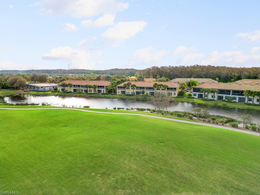 5698 Mayflower Way, Unit 403 Ave Maria, FL 34142 - Photo 25 of 27 a view of lake with city view
