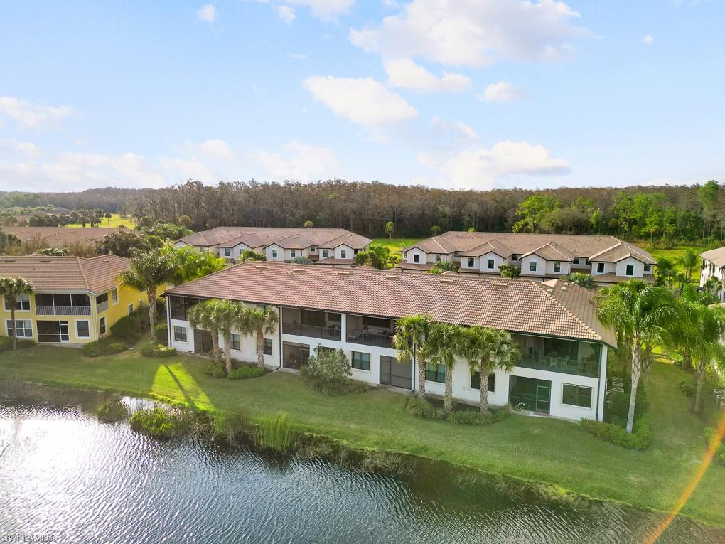 5698 Mayflower Way, Unit 403 Ave Maria, FL 34142 - Photo 27 of 27 a view of a house with a big yard