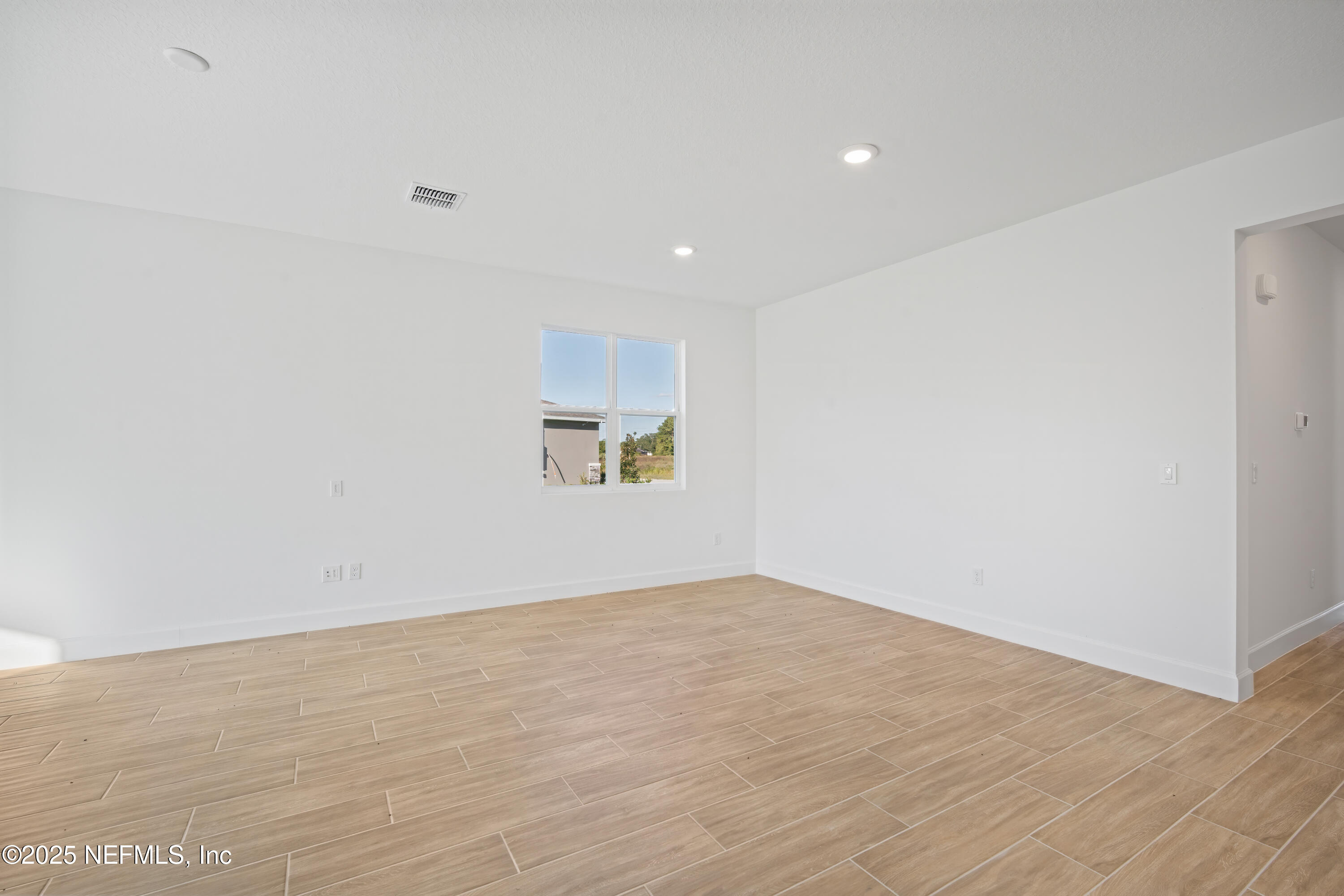 9253 Players Drive Weeki Wachee, FL 34613 - Photo 13 of 30 a view of an empty room