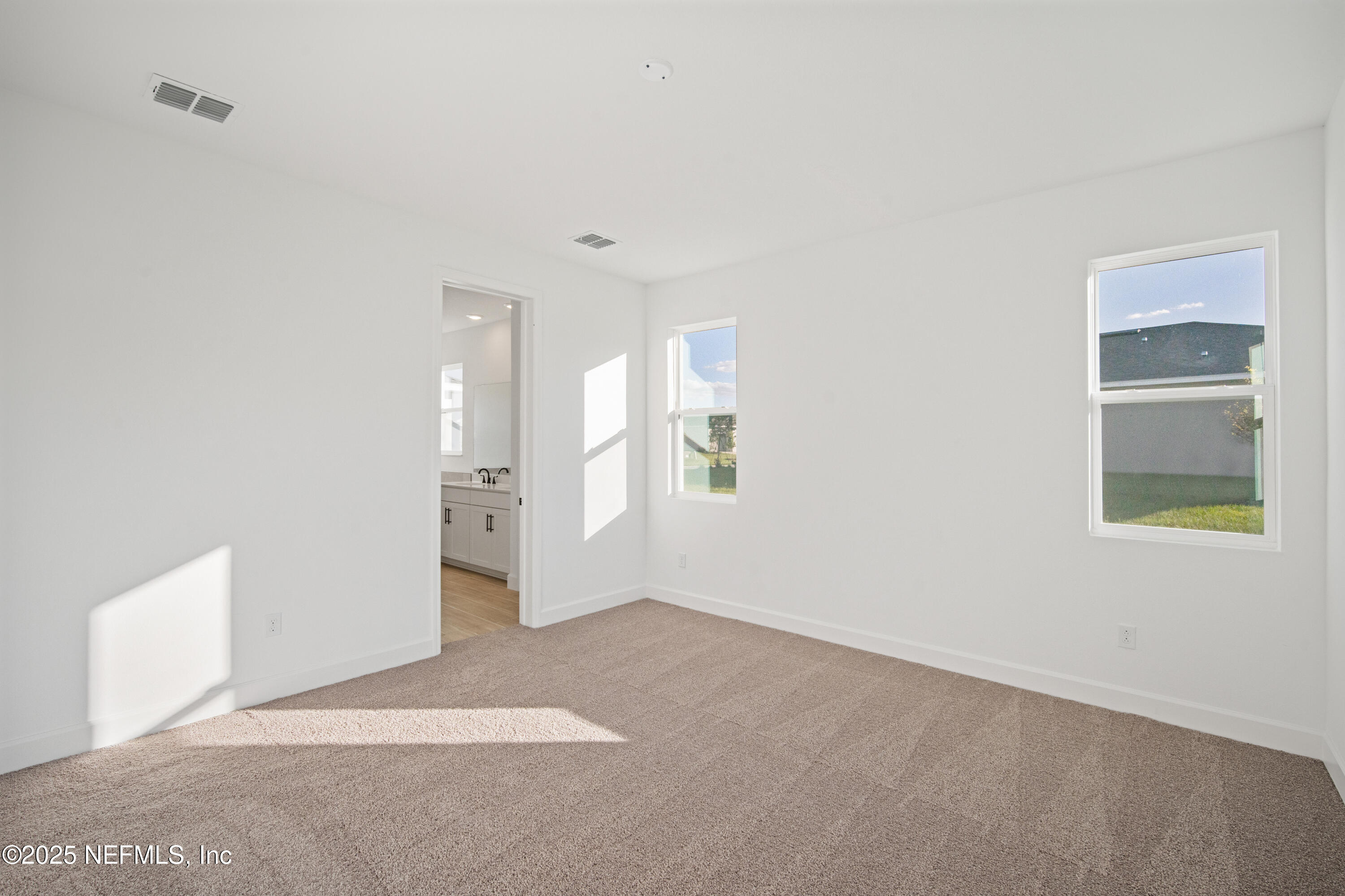 9253 Players Drive Weeki Wachee, FL 34613 - Photo 25 of 30 a view of an empty room