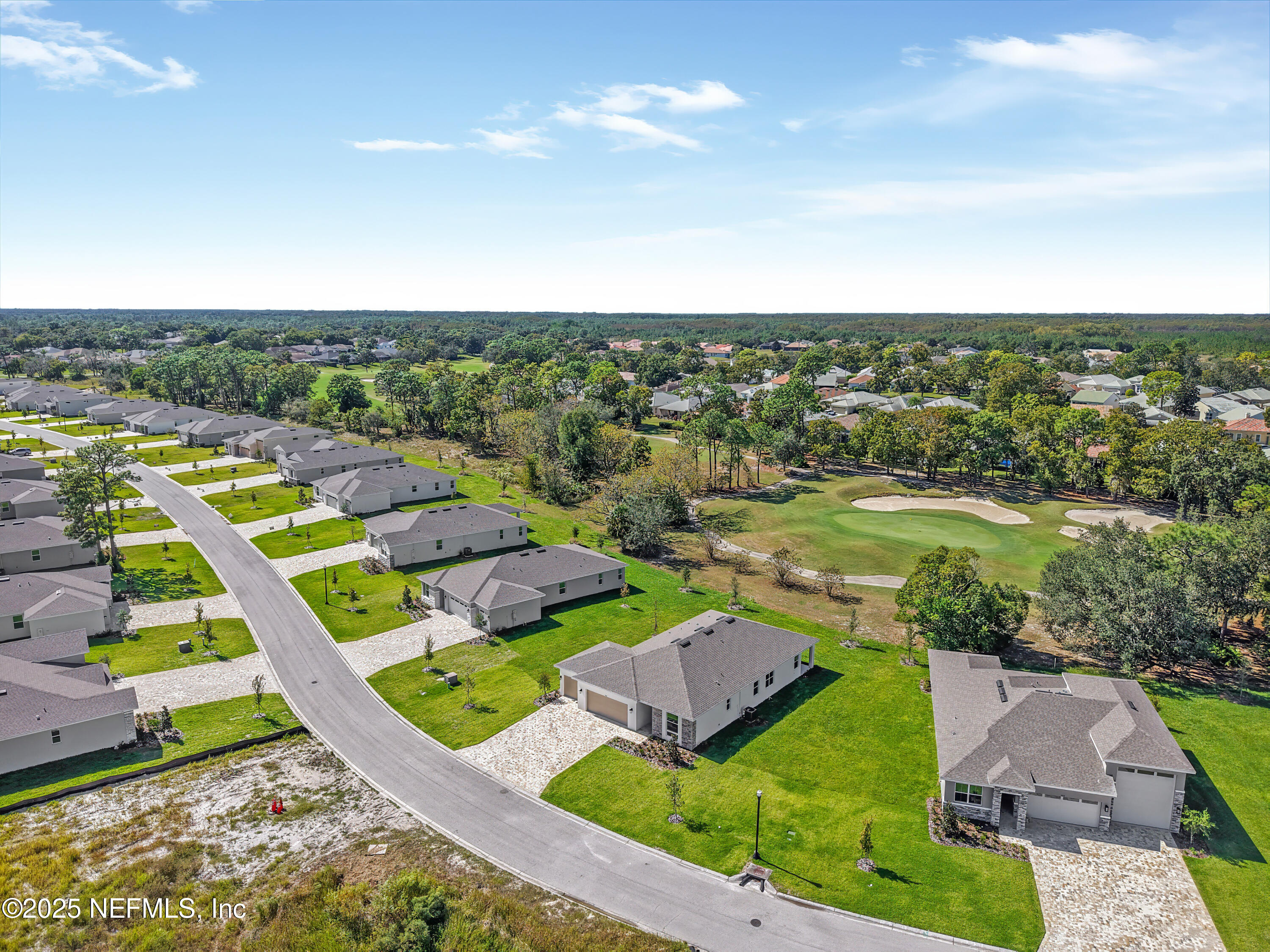 9253 Players Drive Weeki Wachee, FL 34613 - Photo 30 of 30 an aerial view of residential houses with outdoor space and swimming pool