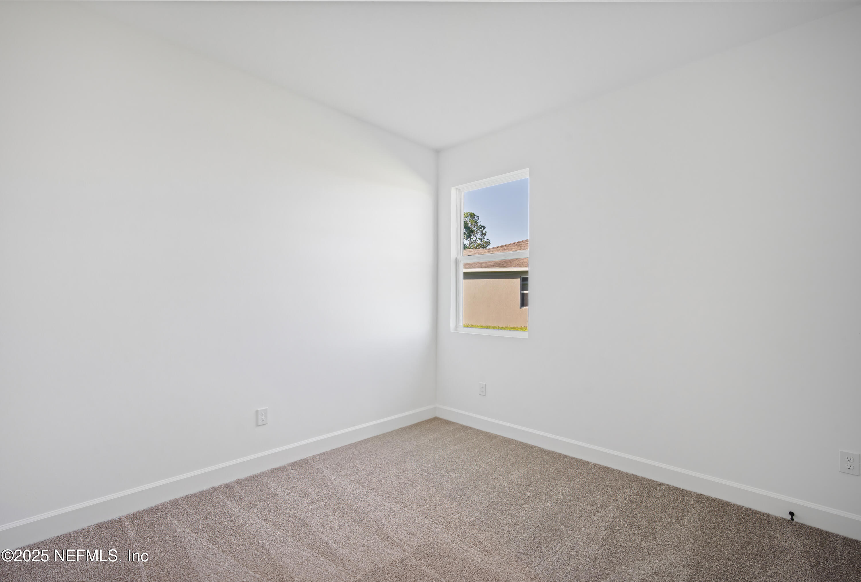 9253 Players Drive Weeki Wachee, FL 34613 - Photo 10 of 30 a view of an empty room