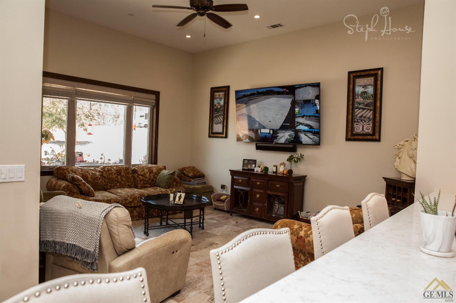 Undisclosed Address Arroyo Grande, CA 93420 - Photo 11 of 39 a living room with furniture and a flat screen tv