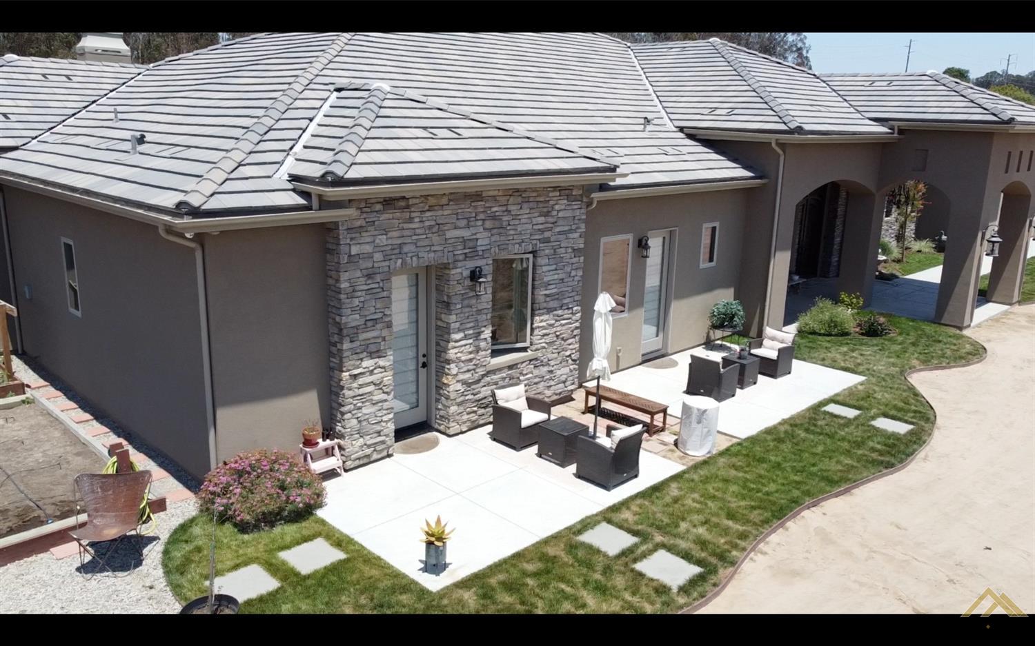 Undisclosed Address Arroyo Grande, CA 93420 - Photo 3 of 39 a view of a patio with couches chairs and potted plants
