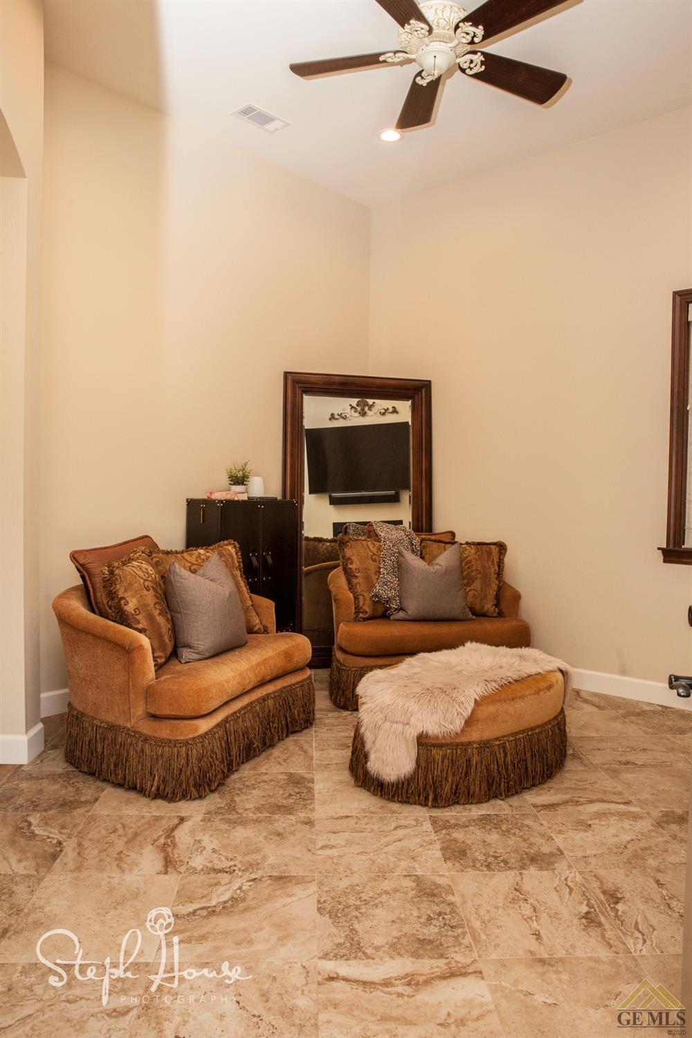 Undisclosed Address Arroyo Grande, CA 93420 - Photo 26 of 39 a living room with furniture and a ceiling fan