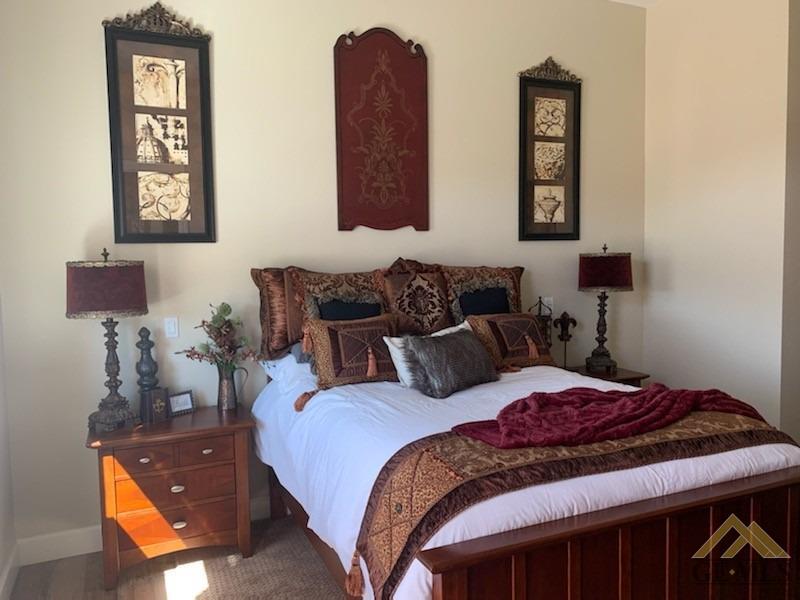 Undisclosed Address Arroyo Grande, CA 93420 - Photo 35 of 39 a bedroom with bed and night stand